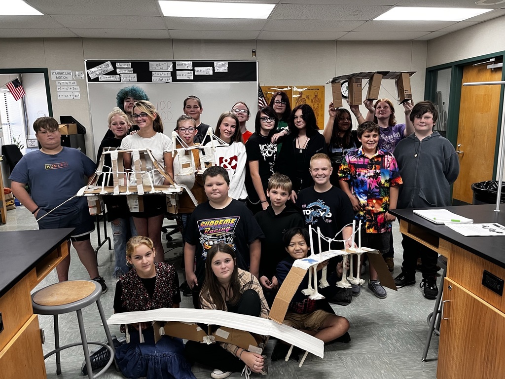 Middle school STEM class with their build a bridge projects